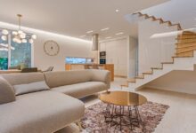aesthetic living room ideas with layered textiles and warm cozy lighting