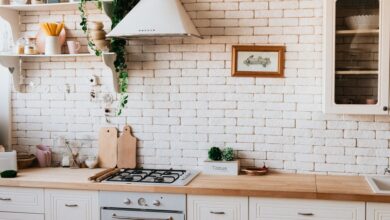 how to decorate a rental apartment with removable wallpaper and rugs