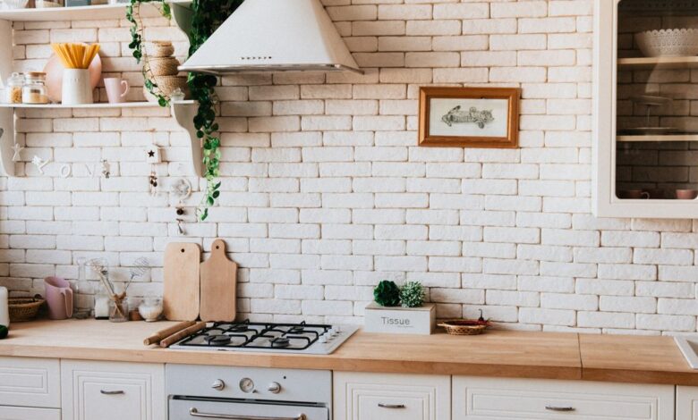 how to decorate a rental apartment with removable wallpaper and rugs