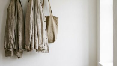 minimal mudroom for a small household with four hooks and one bench