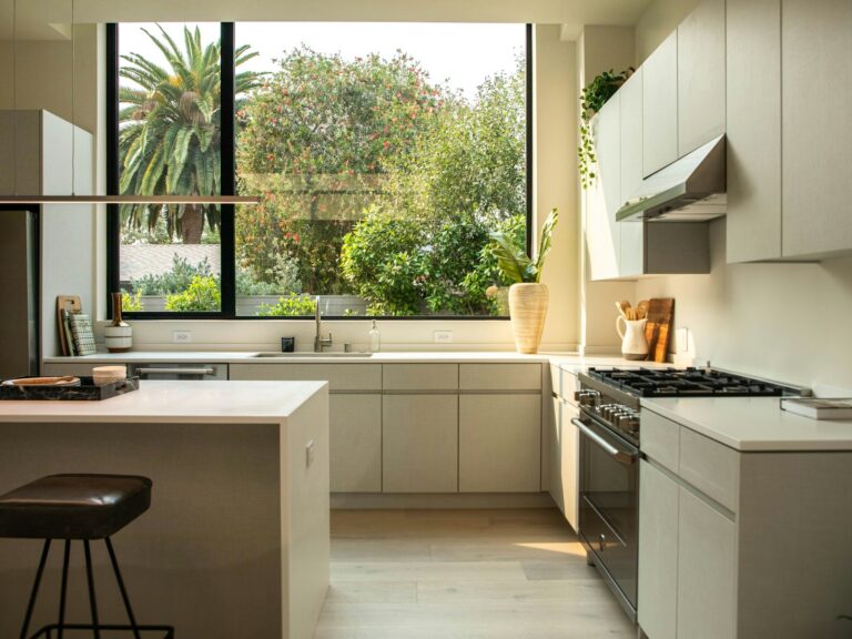 Modern kitchen with island and large window