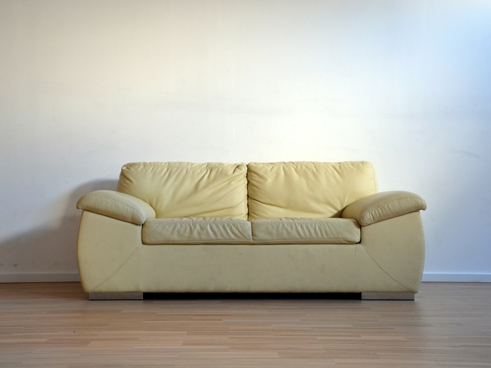Beige leather 2-seat sofa