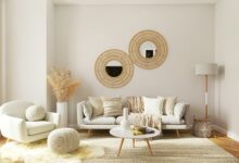 A living room filled with furniture and a mirror