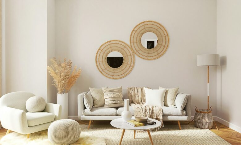 A living room filled with furniture and a mirror