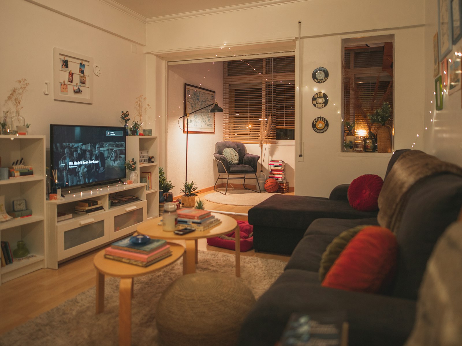 A living room filled with furniture and a flat screen tv