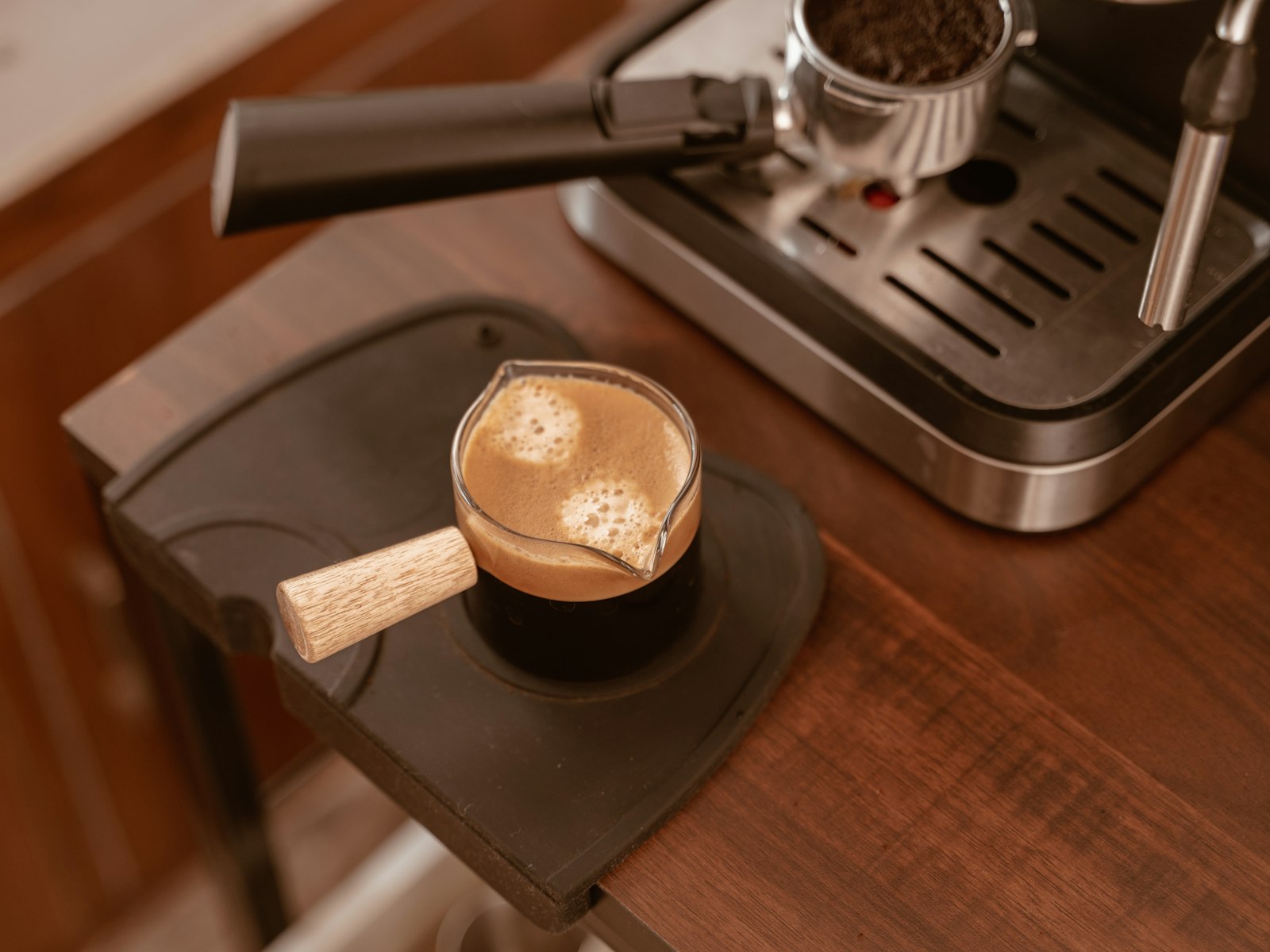 A cup of coffee on a wooden table