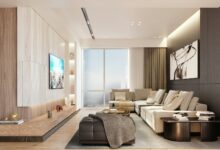 Modern living room with sectional sofa and large window
