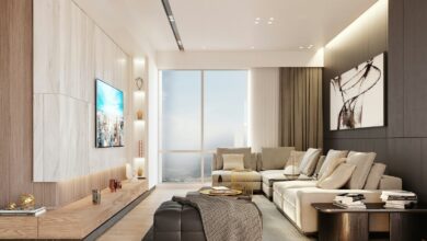 Modern living room with sectional sofa and large window