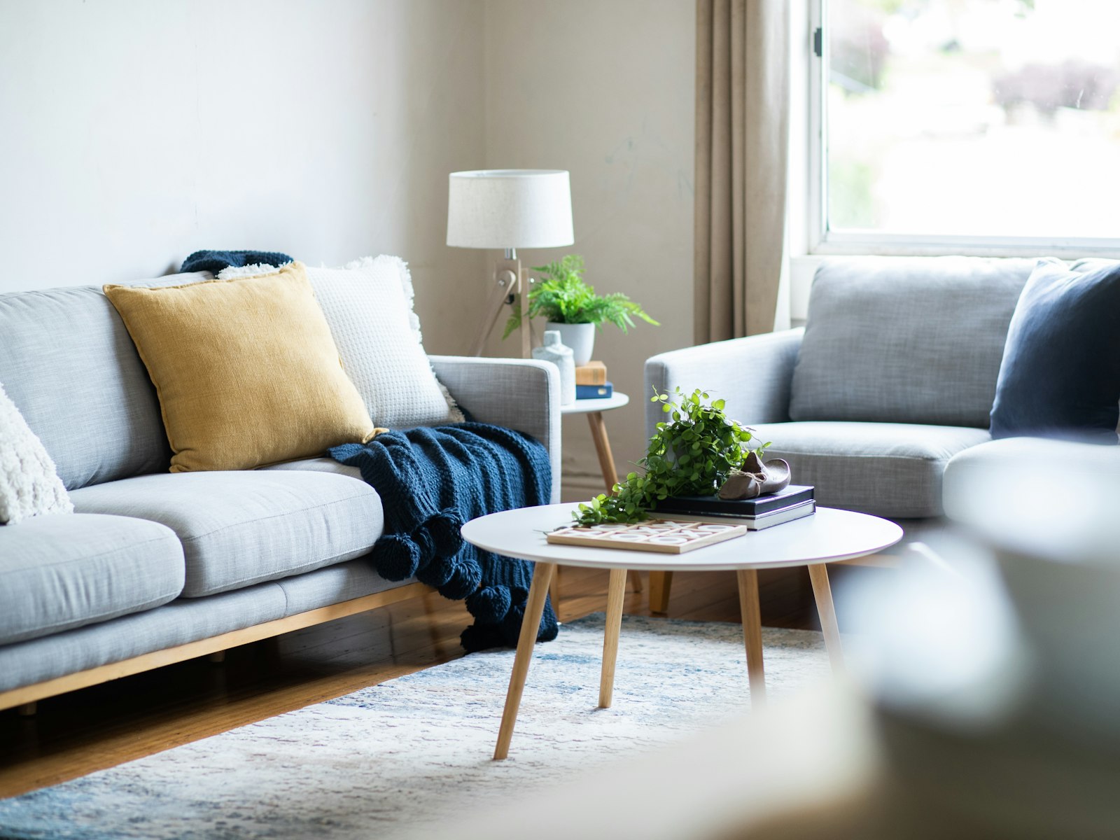 A living room with a couch and a coffee table