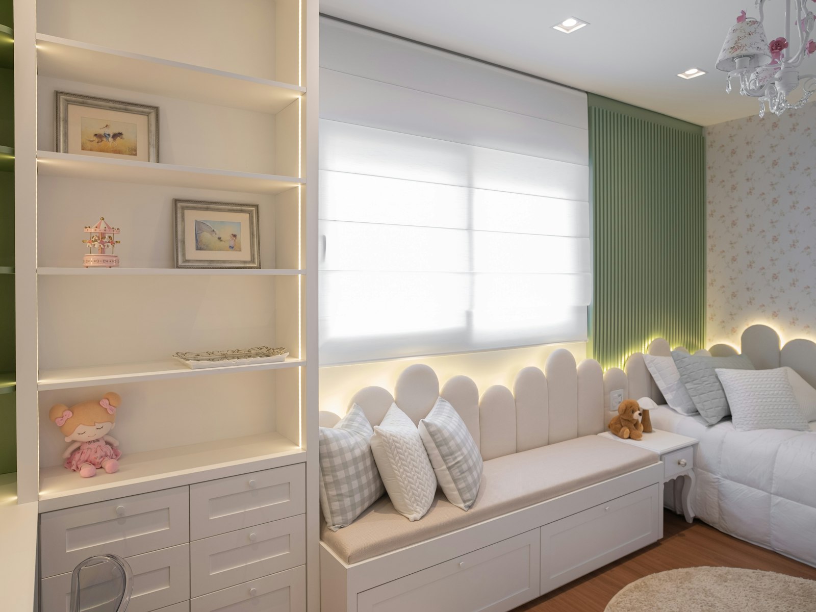 A cozy bedroom with a window seat and shelves