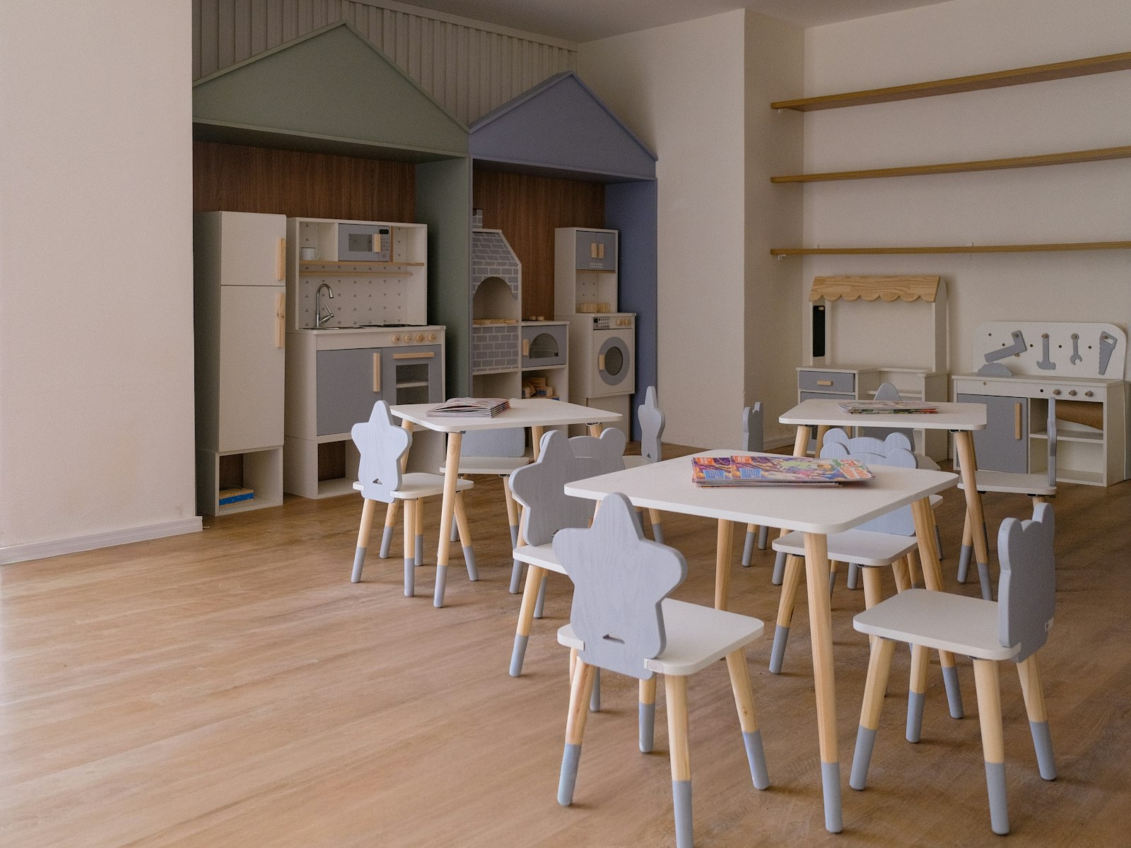 Children's playroom with small tables and chairs