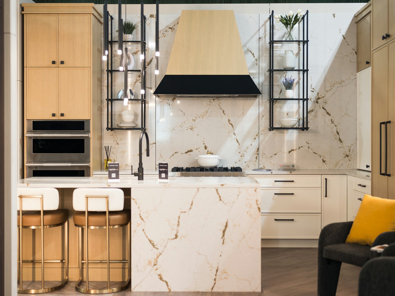 Modern kitchen with marble island and pendant lights