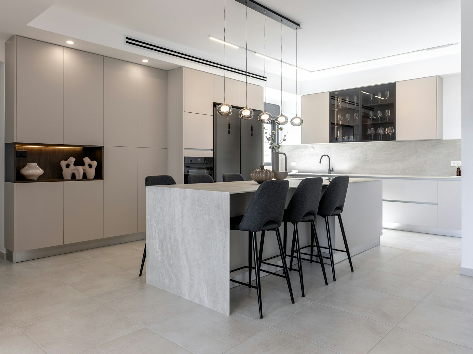 Modern kitchen with island and bar stools