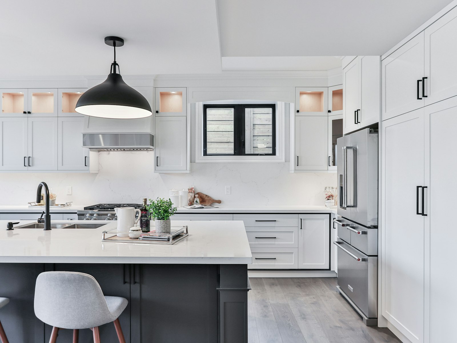 White kitchen cabinets with sink