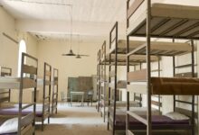 Bunk beds in a dimly lit room