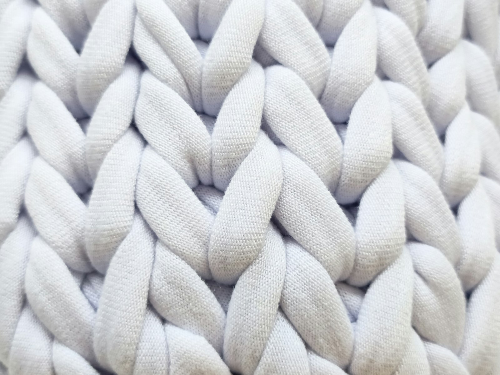 Close-up of a cream chunky knit blanket